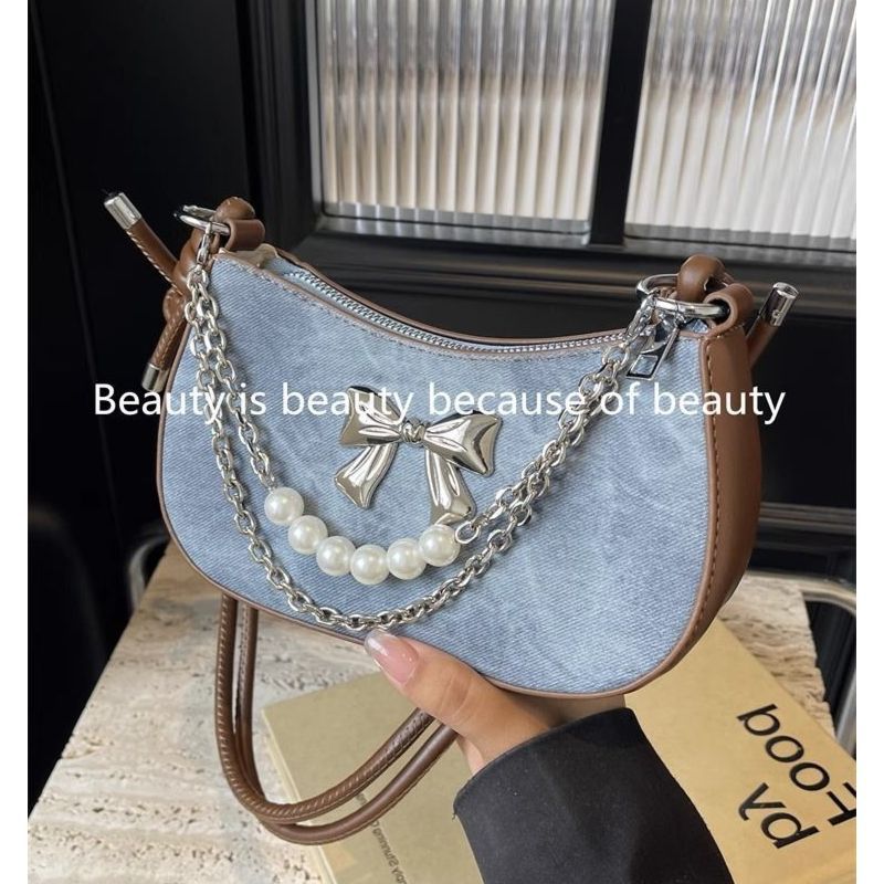 Luxury Bags Wholesale - 高品質人気販売卸売ニッチデザインパールボウ軽量ショルダーバッグファッション高級チェーンピーバッグクロスボディバッグ女性用
