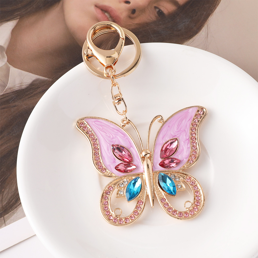 ファッションピンクバタフライ高級グリッターキーホルダー高品質 - Luxury Bags Wholesale のレビューと価格